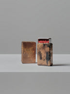 Handmade brass matchbox holder by 13 Knives Melbourne with natural patina, shown with matches