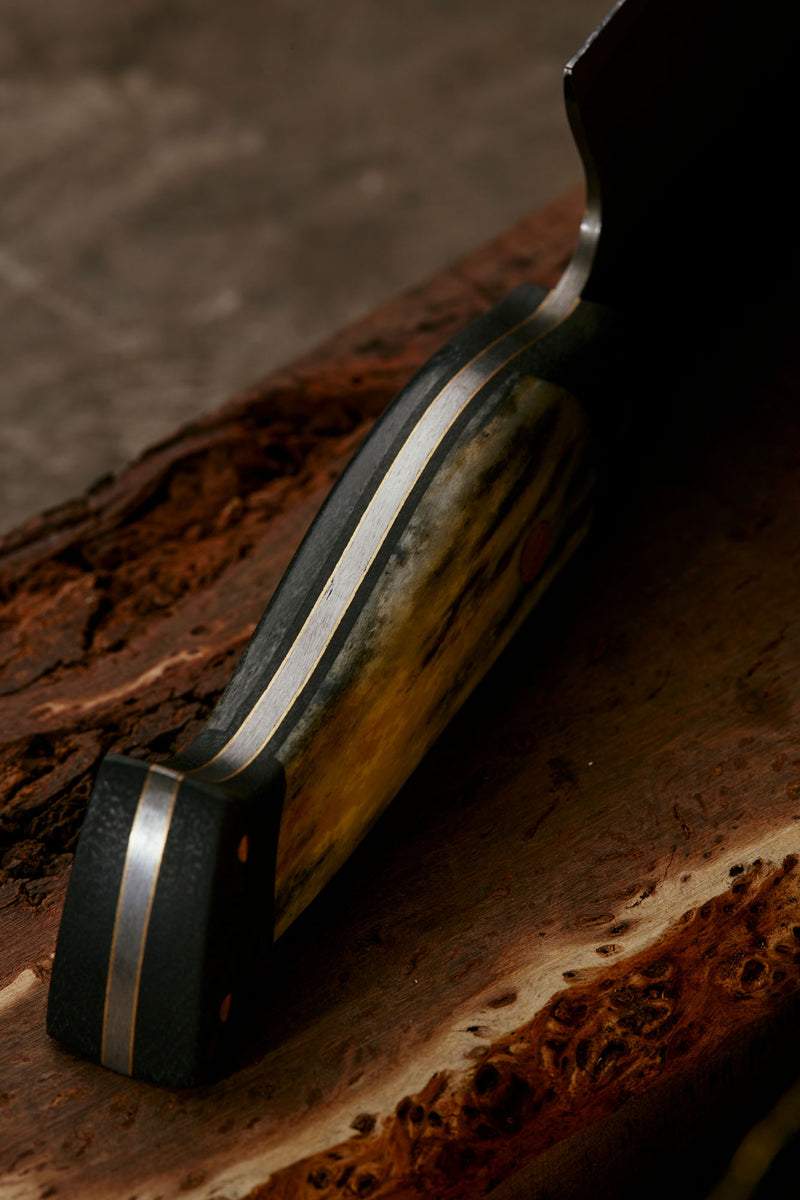 detail of elaborate handle craft on custom commission chef knife hand made in melbourne australia by craftsman bud heyser